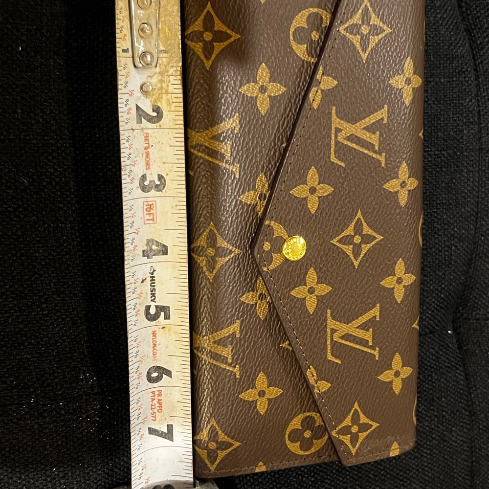 Louis Vuitton Brown and Gold Wallet with Iconic Monogram Design
